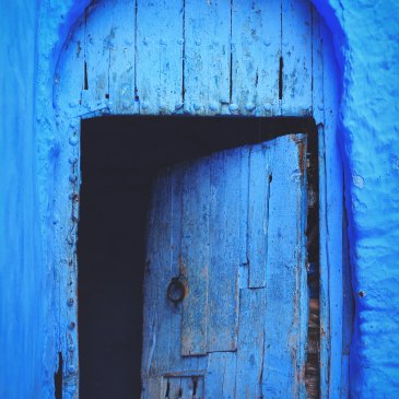 old blue door half open